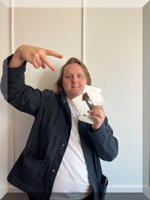 Lewis Capaldi with his Official Singles Chart Number 1 Award for Forget Me (Credit: Official Charts Company)