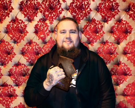 Rag ’n’ Bone Man pictured with his Official Number 1 Award for his album Human [Credit: Official Charts.com]